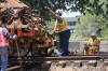 MOW WORKING ON SWITCH TO NEW TRACK TO SHOPS
